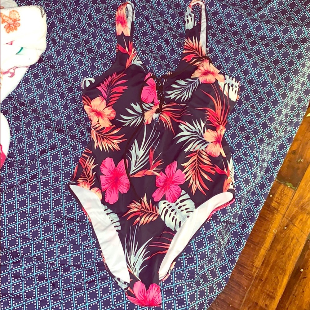 pink one piece.